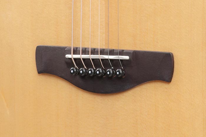 Thermo Aged&trade; Ovangkol Scalloped bridge